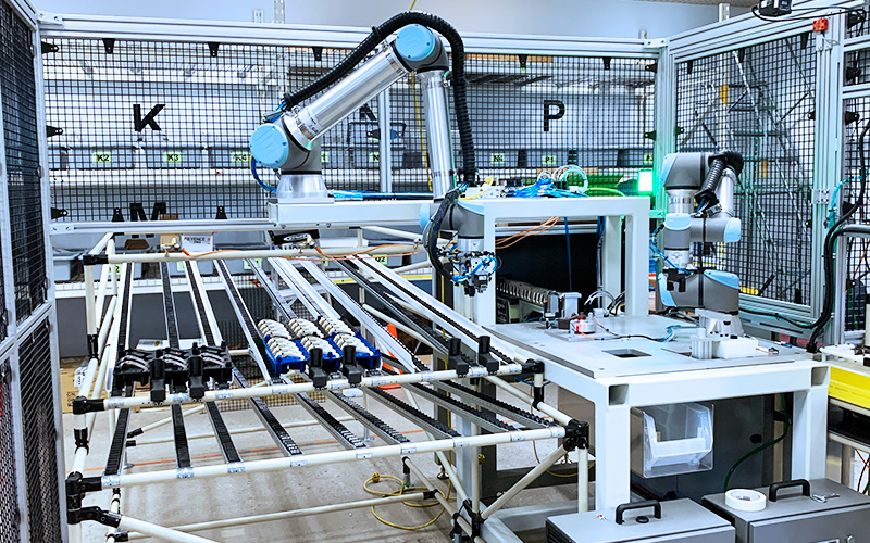 Robotic palletizer cell in end-line manufacturing process