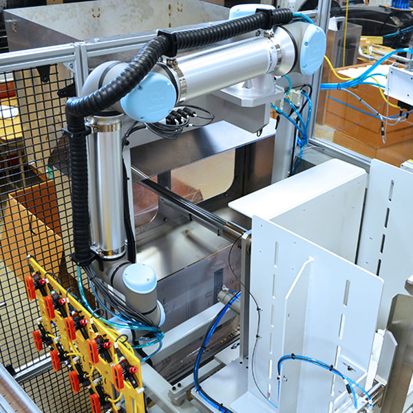 Robotic case packer for manufacturers