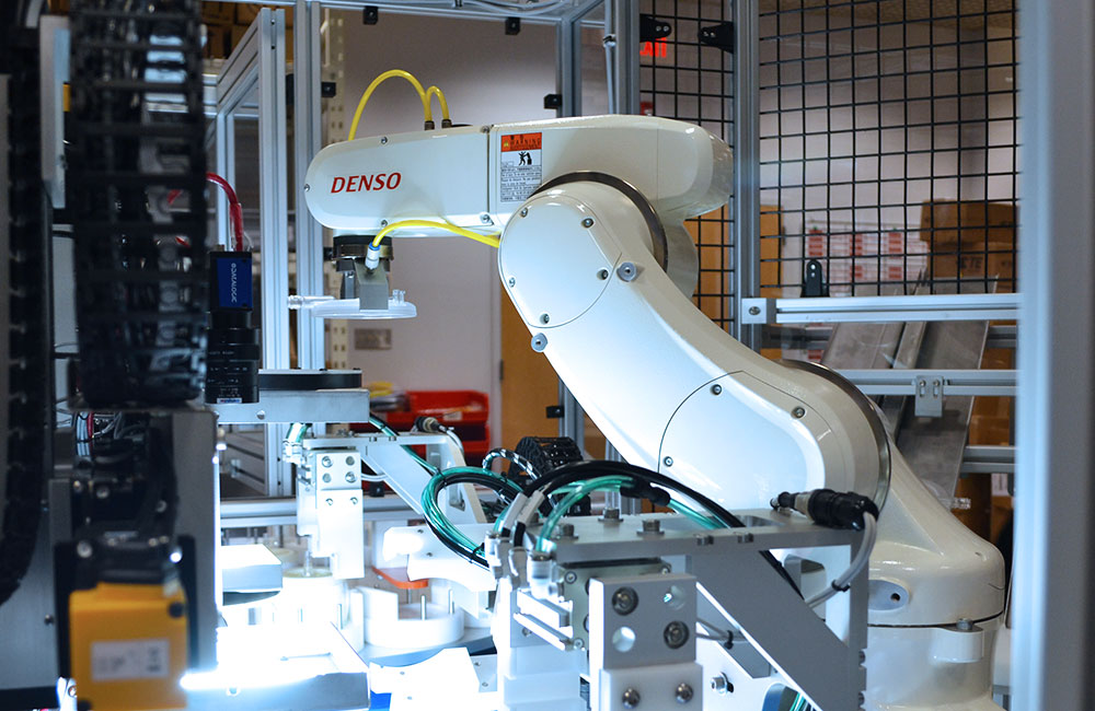 DENSO robotic sell after custom machine design process.
