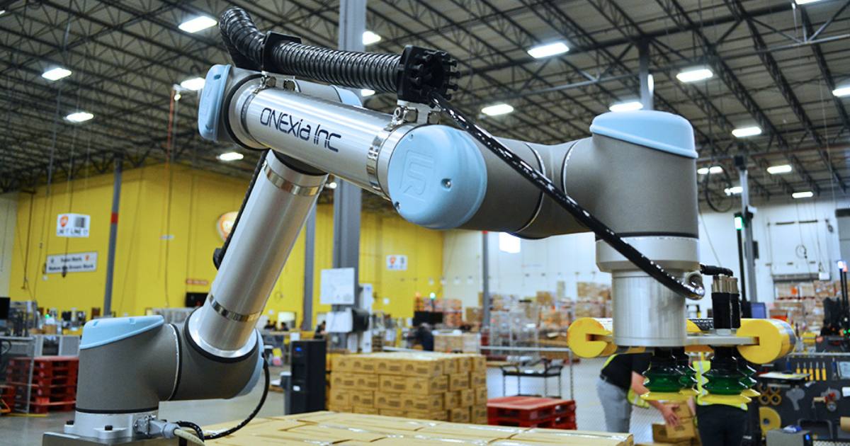 A ONExia palletizing robot used in manufacturing process automation.