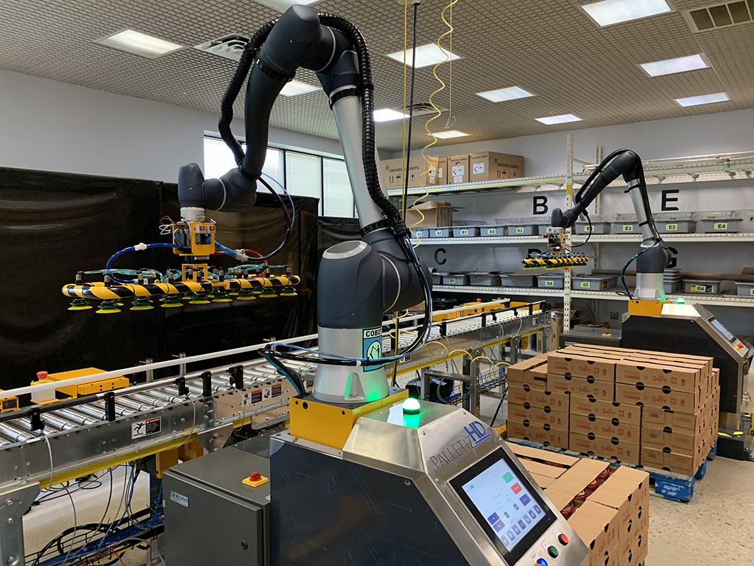 Palletizing robot in manufacturing packing facility.